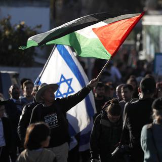 Israël : deuxième samedi de manifestation anti-gouvernementale. [Keystone - Atef Safadi/EPA]
