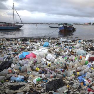 FILE - Litter and debris blanket the shoreline in Cap-Haitien, Haiti, March 10, 2022. Negotiators from around the world gather at UNESCO in Paris on Monday, May 29, 2023, for a second round of talks aiming toward a global treaty on fighting plastic pollution in 2024. (AP Photo/Odelyn Joseph, File) [AP - Odelyn Joseph]