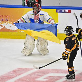 L'équipe ukrainienne junior de hockey au tournois Pee-Wee au Québec. [The Canadian Press via AP/Keystone - Jacques Boissinot]