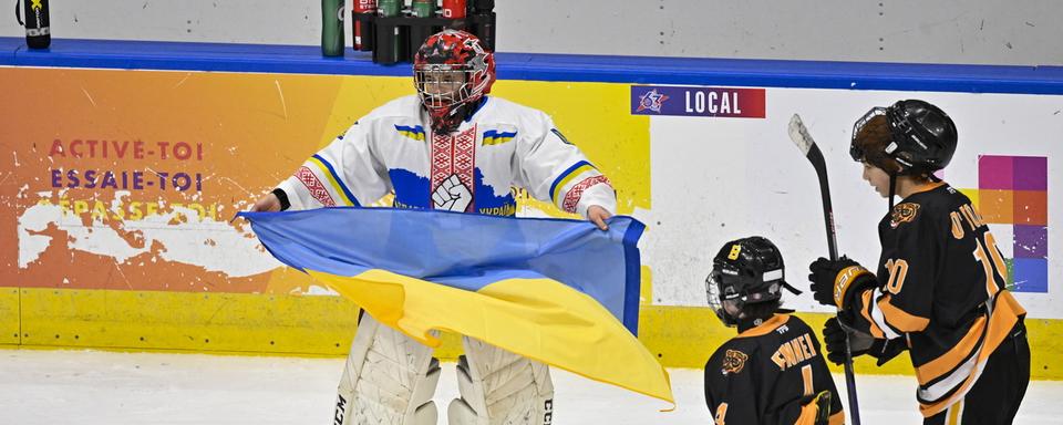 L'équipe ukrainienne junior de hockey au tournois Pee-Wee au Québec. [The Canadian Press via AP/Keystone - Jacques Boissinot]