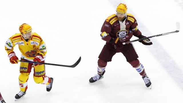 En hockey sur glace, la finale des play-off oppose Bienne à Genève-Servette. [PostFinance/Keystone - Salvatore Di Nolfi]