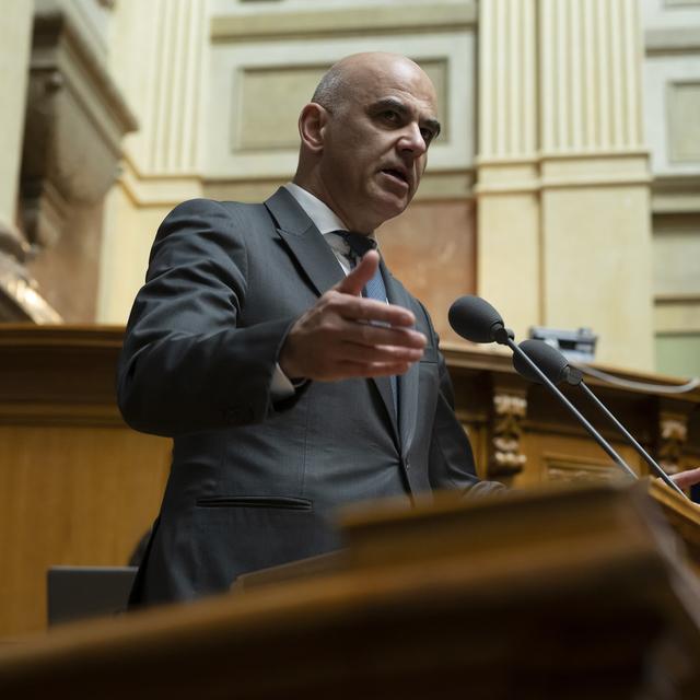 Le président de la Confédération Alain Berset appelle à renforcer la confiance dans les institutions. [Keystone - Anthony Anex]