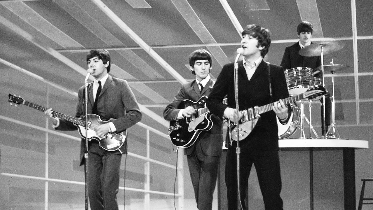 Les Beatles réunis pour une "dernière" chanson grâce à l'intelligence artificielle. [Keystone - AP Photo]