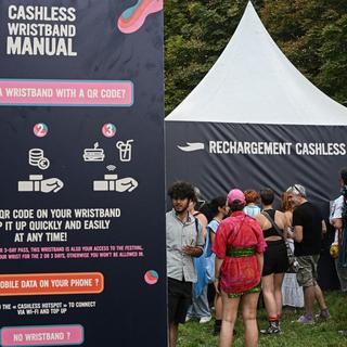 Des festivals "cashless". [AFP - Anna Kurth]