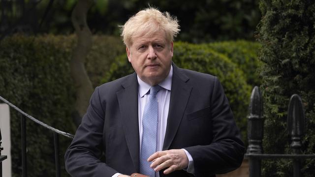 L'ex-Premier ministre britannique Boris Johnson démissionne du Parlement. [Keystone - Alberto Pezzali]