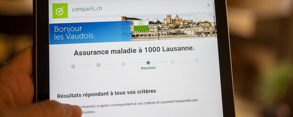 Depuis le 1er janvier 2019, le canton de Vaud a plafonné le poids des primes maladie à 10% du revenu net des ménages. [Keystone - Christian Beutler]