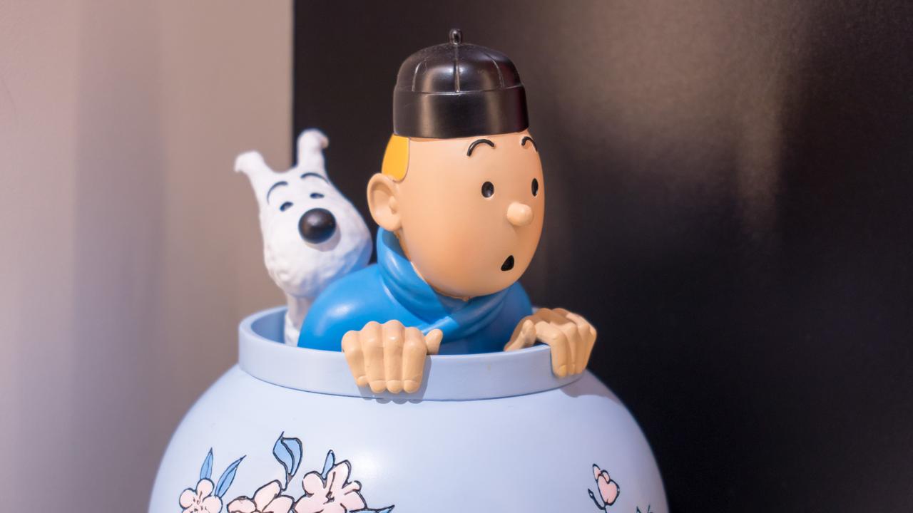 Tintin et Milou, l'homme et l'animal inséparables. [AFP - Wang gang / Imaginechina]