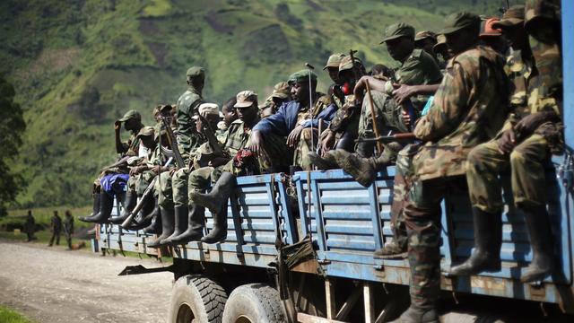 Des combattants en RDC. [KEYSTONE - AP Photo/Jerome Delay]