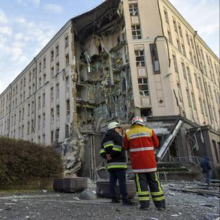 Un immeuble de Kiev touché par un missile, le 31 décembre 2022. [Keystone - Oleg Petrasyuk]