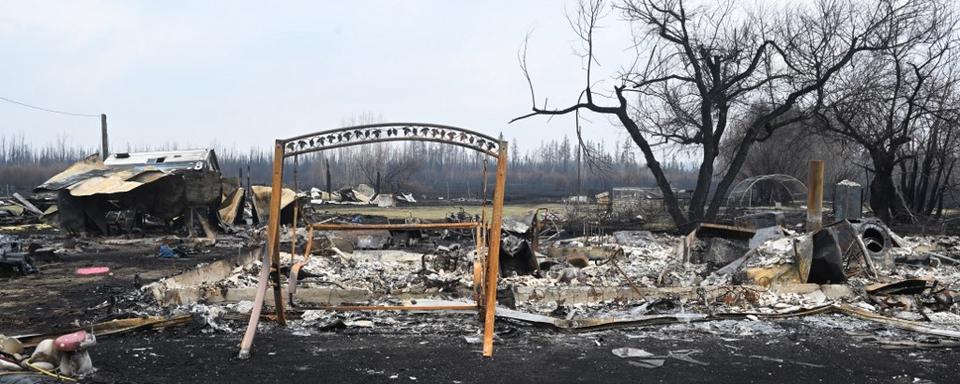 Le Canada peine à maîtriser les multiples incendies. [AFP - Walter Tychnowicz]