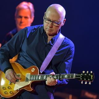 Le chanteur et guitariste écossais Mark Knopfler en concert à Zurich le 9 mai 2019. [Keystone - Walter Bieri]