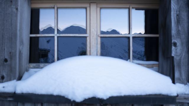 Dimanche, la limite pluie-neige pourrait descendre jusqu'à 700 mètres. [Keystone - Gian Ehrenzeller]