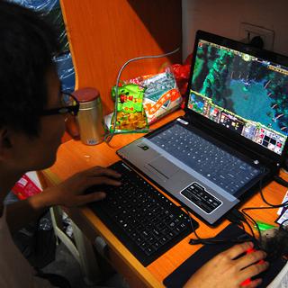 Un étudiant chinois joue à World of Warcraft en 2019. [Depositphotos - ChinaImages]
