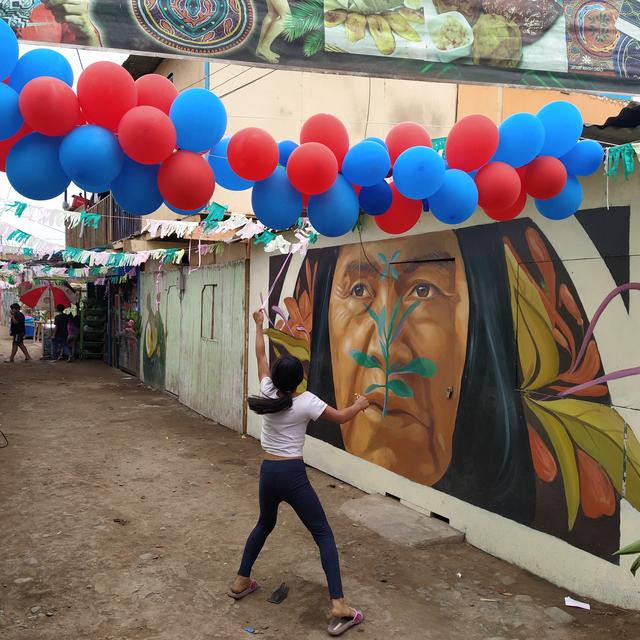Murs peints dans la communauté shipibo du quartier de Cantagallo à Lima. [RTS - Wyloën Munhoz-Boillot]