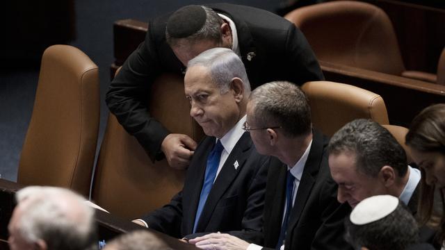 Benjamin Netanyahou veut limiter les pouvoirs de la justice israëlienne et permettre à son gouvernement d'extrême-droite d'avoir les pleins pouvoirs. [Keystone/AP Photo - Maya Alleruzzo]