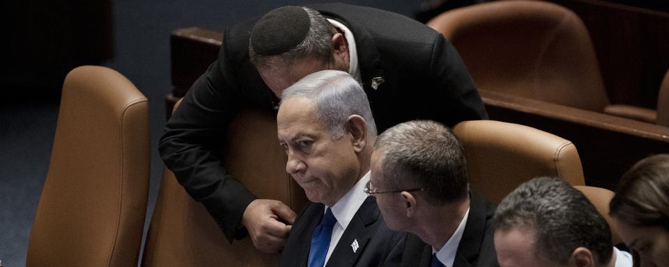 Benjamin Netanyahou veut limiter les pouvoirs de la justice israëlienne et permettre à son gouvernement d'extrême-droite d'avoir les pleins pouvoirs. [Keystone/AP Photo - Maya Alleruzzo]