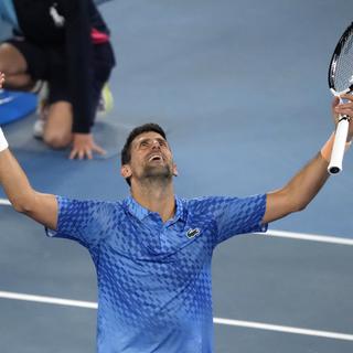 Djokovic, qui n'a pas été inquiété dans cette finale, célèbre son triomphe. [Mark Baker]