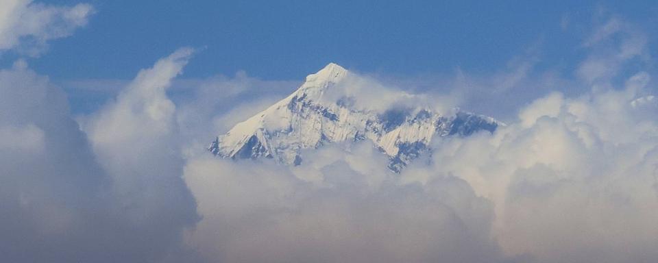 La cime de l'Everest attire toujours, 70 ans après sa conquête. [AFP - Sébastien Berger]