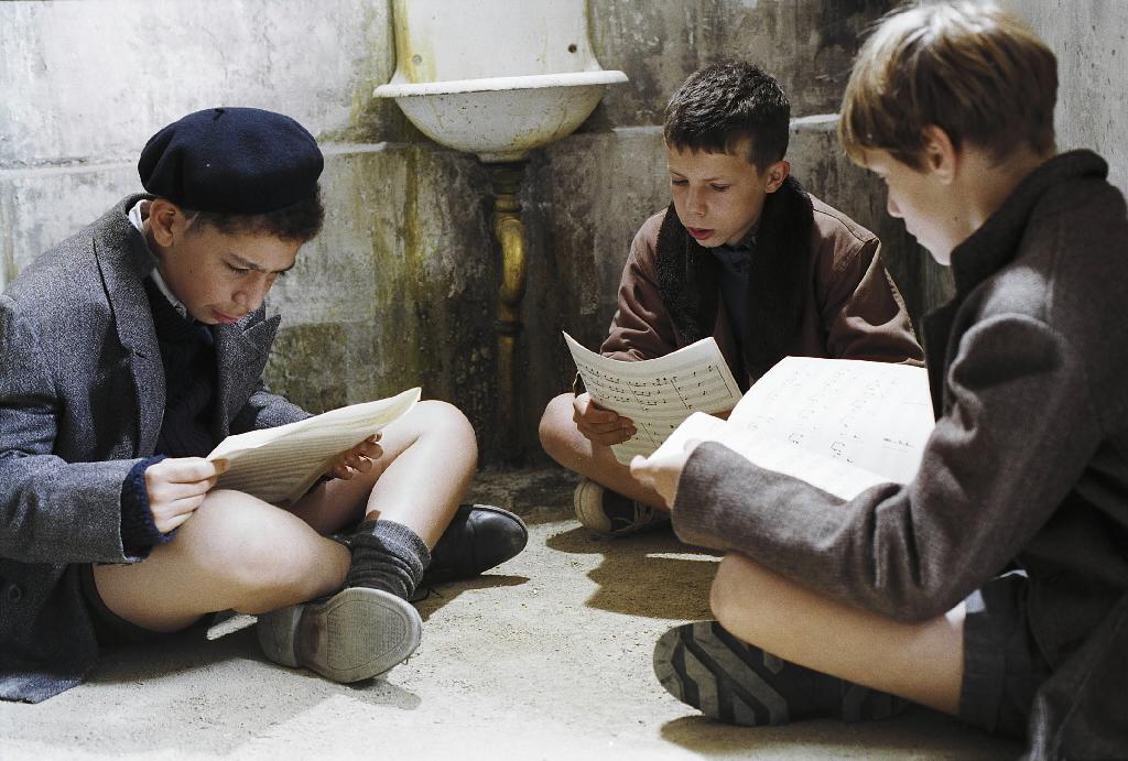 Trois jeunes élèves du pensionnat Le fond de l'étang du film "Les choristes". [Vega Distribution]