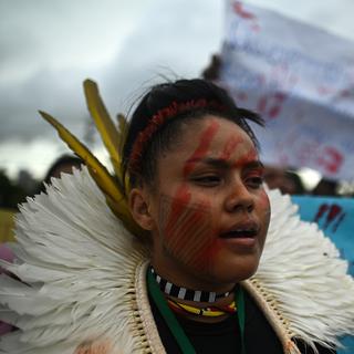 Les personnes indigènes de la région amazonienne sont très souvent assassinées à cause de leur défense de l'environnement. [Keystone/EPA - Andre Borges]