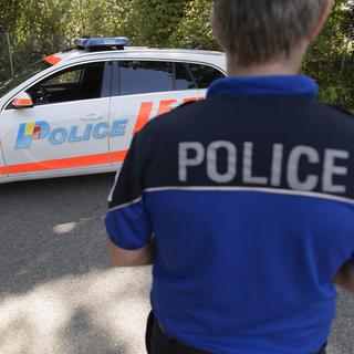 Un policier de la Police cantonale genevoise. Image prétexte. [Keystone - Martial Trezzini]