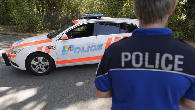 Un policier de la Police cantonale genevoise. Image prétexte. [Keystone - Martial Trezzini]