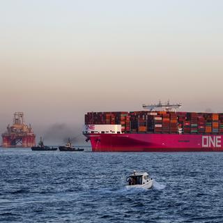 Un container maritime en Mer Méditerranée, 28.07.23. [Keystone/EPA - A. Carrasco Ragel]