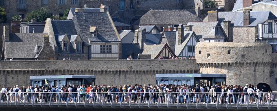 Le Mont-Saint-Michel va mettre en place des mesures incitative pour fluidifier l'afflux de touristes. [AFP - Damien Meyer]