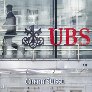 Les logos d'UBS et Credit Suisse. [Keystone - Ennio Leanza]