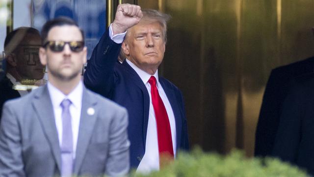 Donald Trump avant son entrée dans le tribunal pénal de Manhattan. [Keystone - AP Photo/Corey Sipkin]