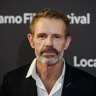 L'acteur français Lambert Wilson au festival de Locarno, le 2 août 2023. [Keystone - Jean-Christophe Bott]