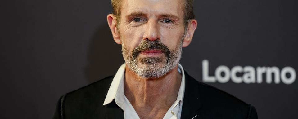 L'acteur français Lambert Wilson au festival de Locarno, le 2 août 2023. [Keystone - Jean-Christophe Bott]