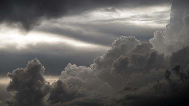 La prédiction précise des orages reste un défi pour les météorologues. [Keystone - Peter Schneider]