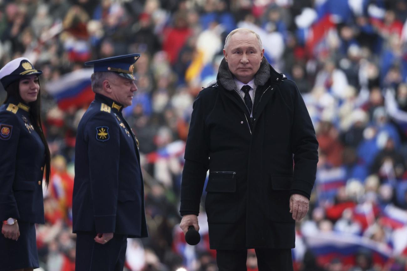 Vladimir Putin a prononcé un discours patriotique mercredi 22 février à Moscou. [Keystone/Sputnik - Mikhail Metzel]