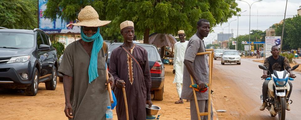 Après le coup d'État, la crainte d'une intervention militaire est réelle au sein de la population du Niger (image d'illustration). [Keystone/EPA - Issifou Djibo]