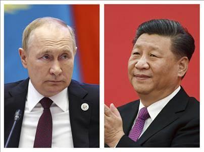 Invité par Vladimir Poutine, Xi Jinping se rendra en Russie du 20 au 22 mars. [Keystone]