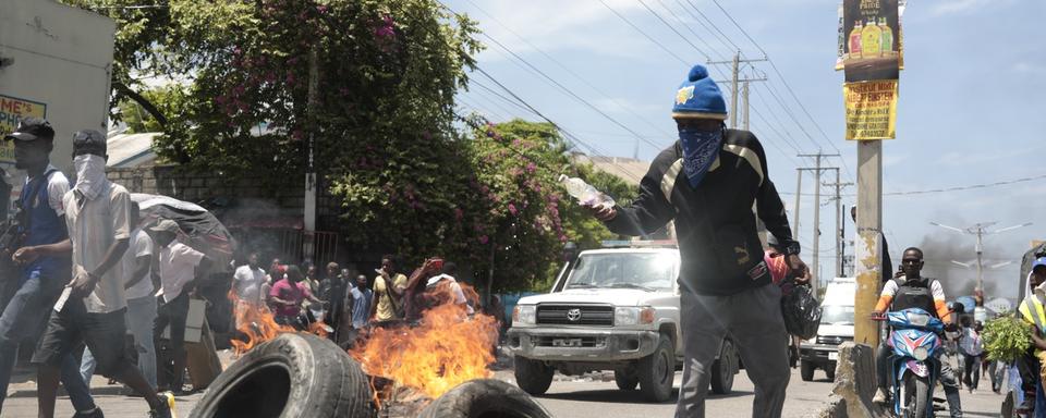 "Ils sont pires que des monstres": Haïti est plongé dans la violence des gangs. [KEYSTONE - ODELYN JOSEPH]