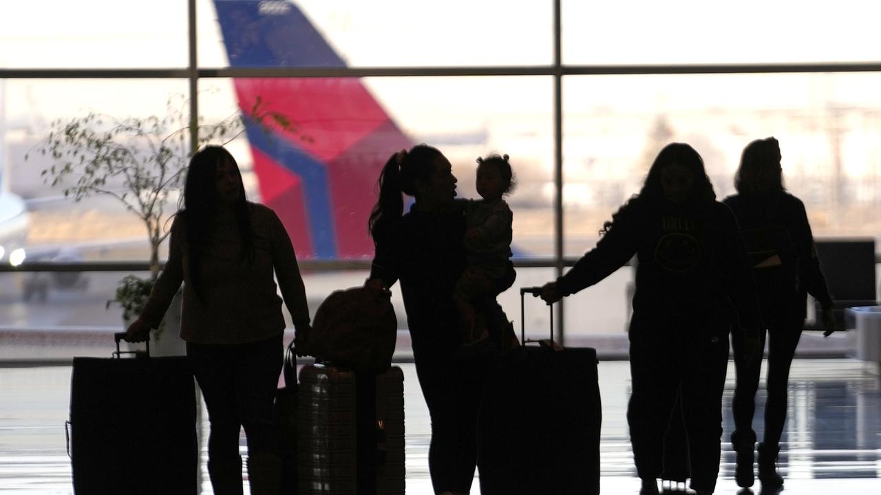 Des voyageurs à l'aéroport de Salt Lake City, aux Etats-Unis, le 11 janvier 2023. [AP/Keystone - Rick Bowmer]
