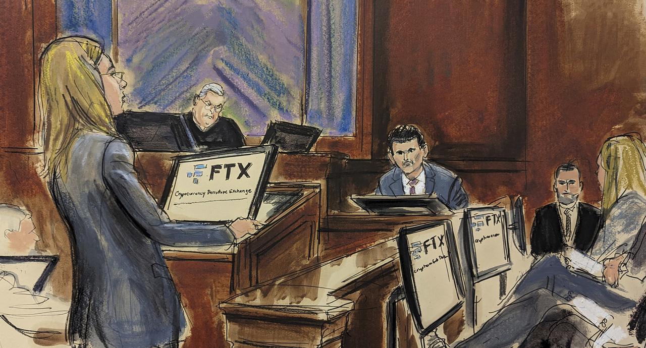 Dans ce croquis de salle d'audience, le fondateur de FTX Sam Bankman-Fried est contre-interrogé par l'assistante du procureur fédéral de Manhattan Danielle Sassoon, tandis que le juge Lewis Kaplan et les membres du jury écoutent les réponses de l'accusé. [KEYSTONE - Elizabeth Williams / AP Photo]