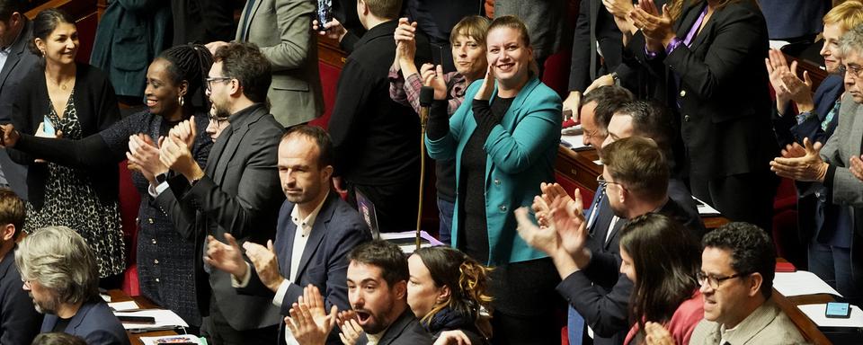 En France, le projet de loi sur l’immigration a été rejetée par les députés députés de l'Assemblée nationale. [AP Photo/Keystone - Michel Euler]