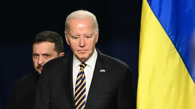 Le président américain Joe Biden et le président ukrainien Volodymyr Zelensky avant une conférence de presse à la Maison Blanche à Washington le 12 décembre 2023. [AFP - Mandel Ngan]