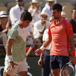 Novak Djokovic et Carlos Alcaraz. [Keystone - AP Photo/Thibault Camus]