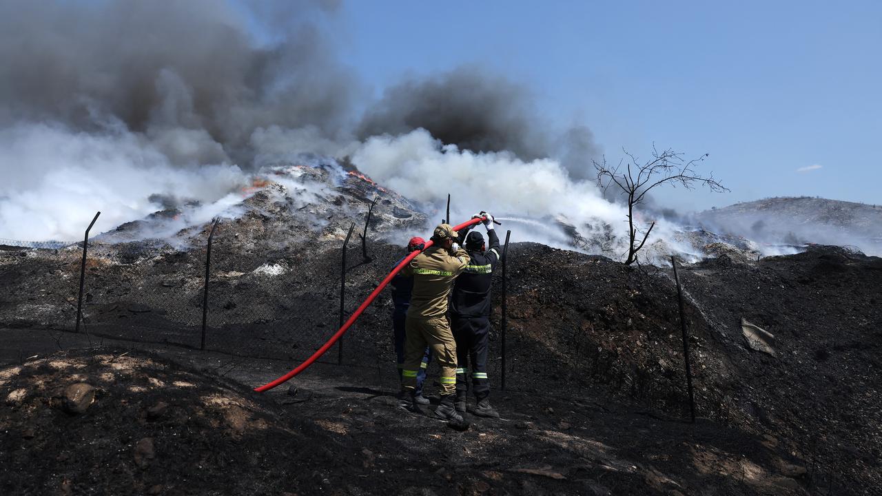 Les feux en Grèce "sous contrôle" mais les pompiers restent "sur le pied de guerre". [ANADOLU AGENCY VIA AFP - COSTAS BALTAS]