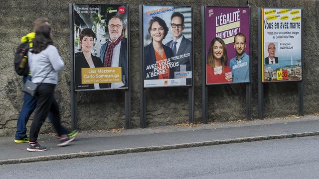 Des affiches électorales des différents partis politiques a Genève en vue des élections fédérales, le dimanche 6 octobre 2019. [Keystone - Martial Trezzini]