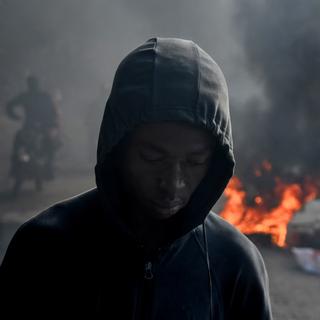 Le Premier ministre haïtien Ariel Henry a démissionné après plusieurs manifestations d'une population plongée dans le chaos à cause de la guerre entre la police et les gangs locaux. [Keystone/EPA - Siffroy Clarens]