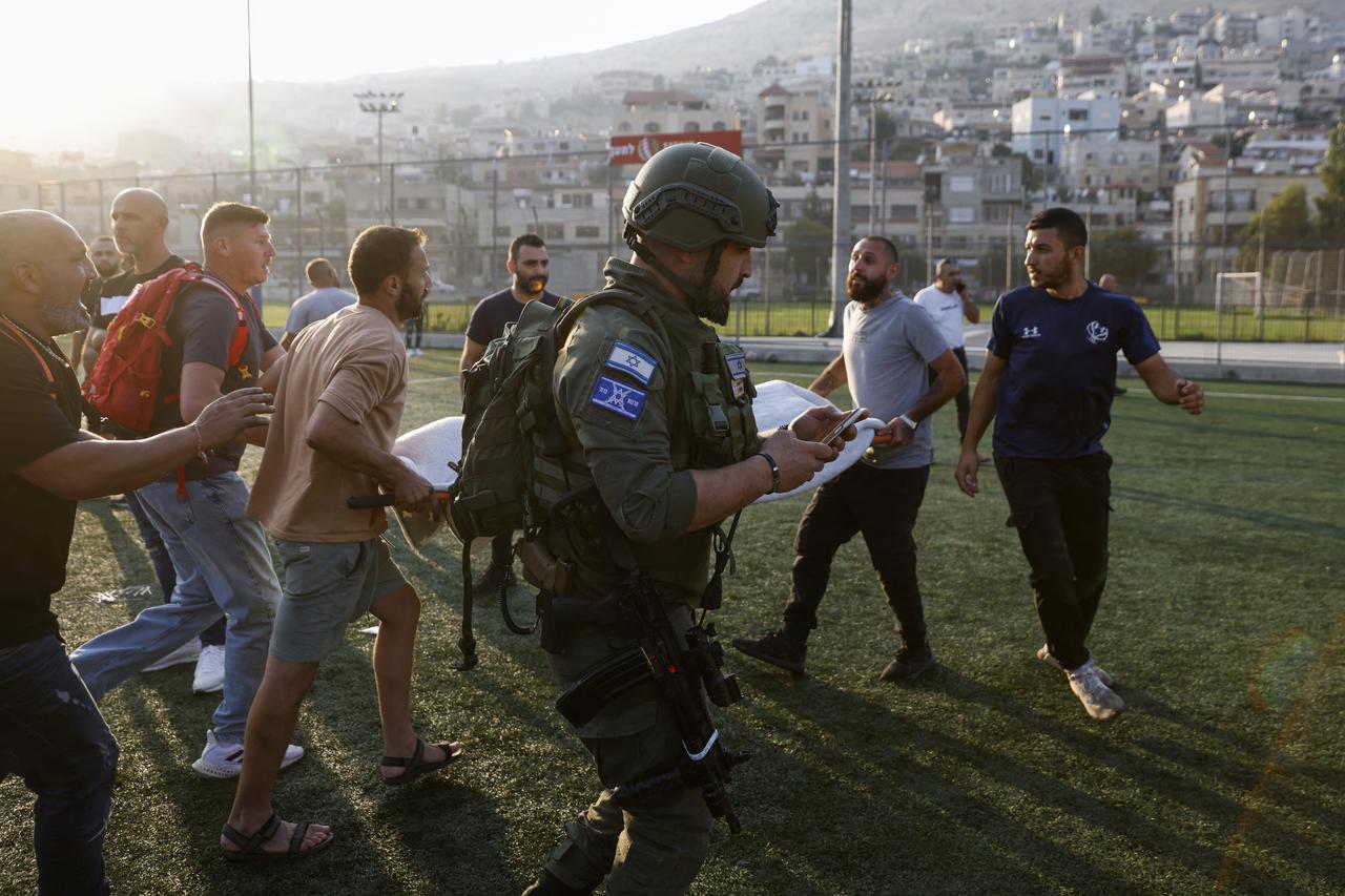 Des tirs de roquette ont fait 12 morts et 18 blessés sur le Golan annexé en Israël. [AFP - JALAA MAREY]