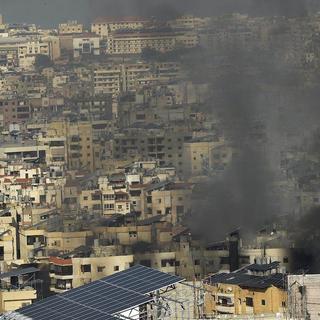 Des dizaines d'immeubles de la banlieue sud de Beyrouth ont été détruits par l'aviation israélienne. [Keystone]