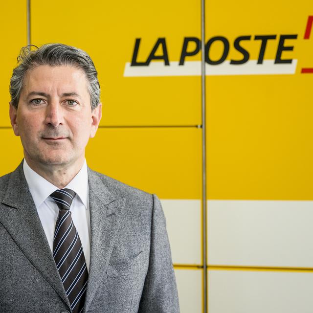 La Poste et les syndicats ont annoncé mercredi s'être mis d'accords sur les nouvelles CCT (image d'illustration). [Keystone - Jean-Christophe Bott]