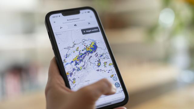 L'application de Météosuisse sur un smartphone. [KEYSTONE - ENNIO LEANZA]