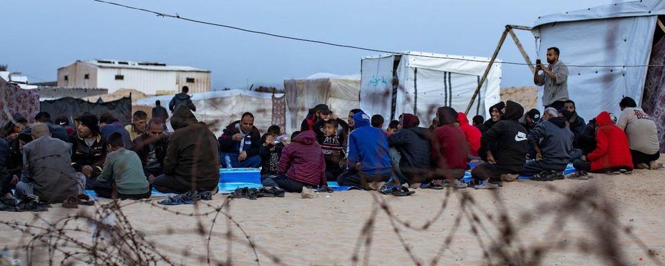 Douze personnes ont été tuées par un tir israélien sur la tente de déplacés à Khan Younès. [Keystone]